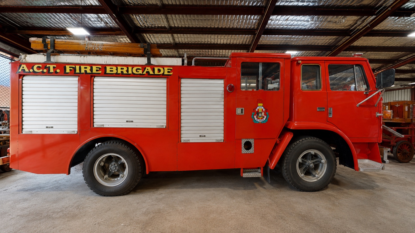 1972 International Acco fire truck side profile inside the museum