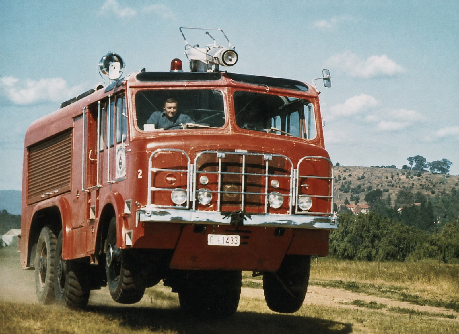 1963 Thornycroft Nubian airport fire truck in service on an unsealed road